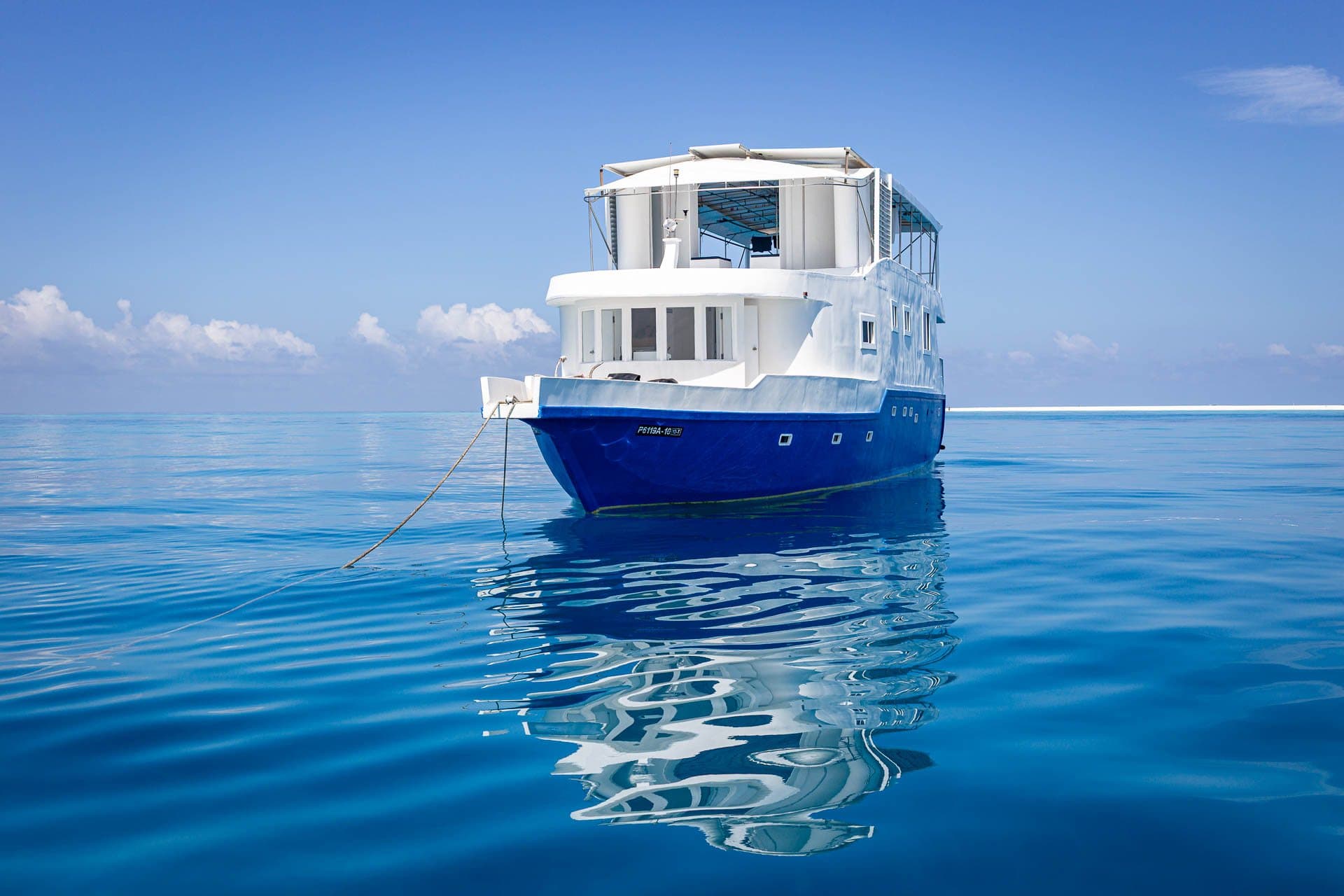 NOAH's bow on a calm blue lagoon