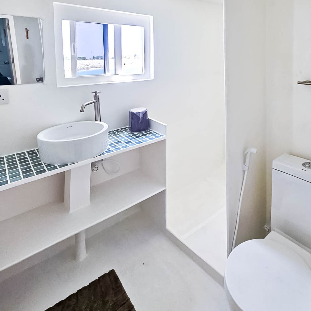 Modern white en-suite bathroom on board NOAH