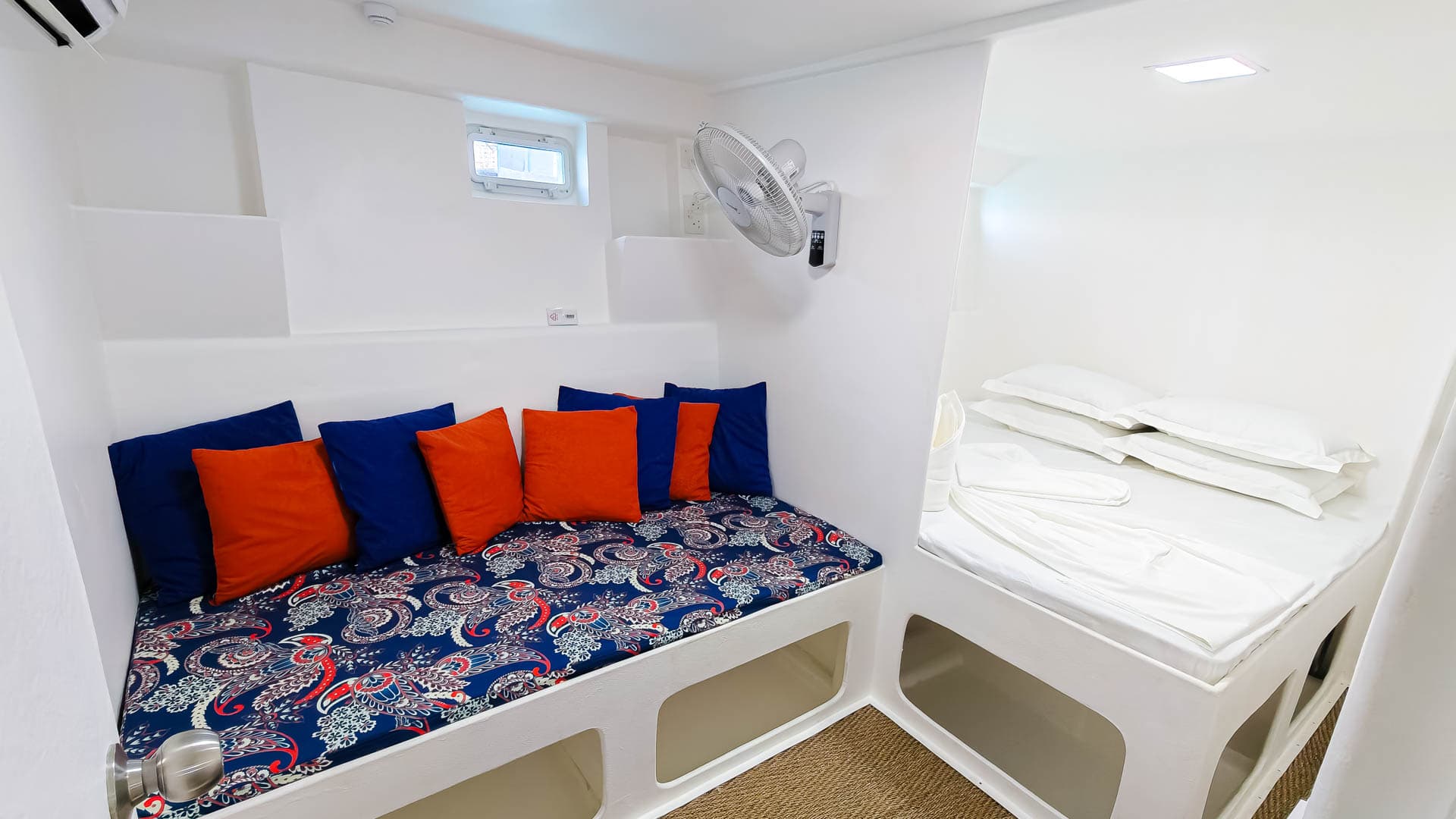 Modern white en-suite cabin bathroom on the NOAH safari boat